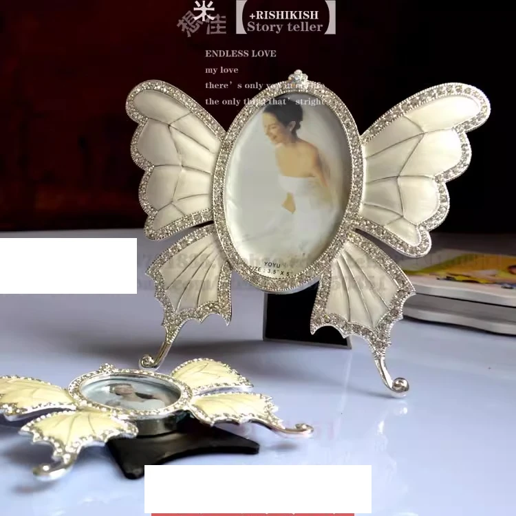 إطار صورة مرصع بالألماس على الطراز الأوروبي من بوتيك، إطار صورة على شكل فراشة معدنية، إطار صورة غراء أبيض فضي 5 بوصة