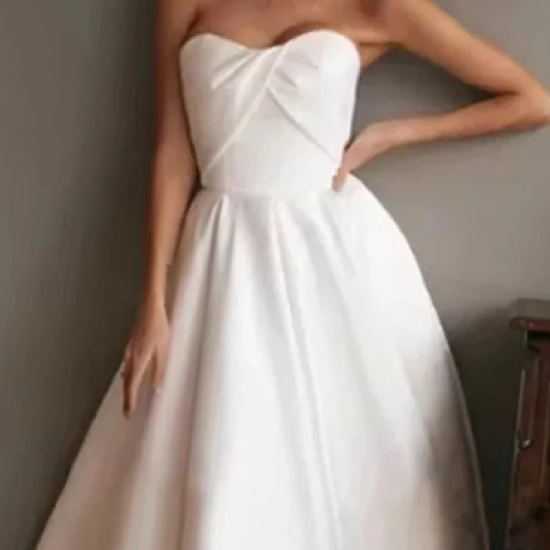 Biała suknia ślubna bez ramiączek dla kobiety, satynowa suknia wieczorowa w kształcie litery A, bez rękawów, elegancka sukienka na przyjęcie o długości do herbaty, szyta na miarę.