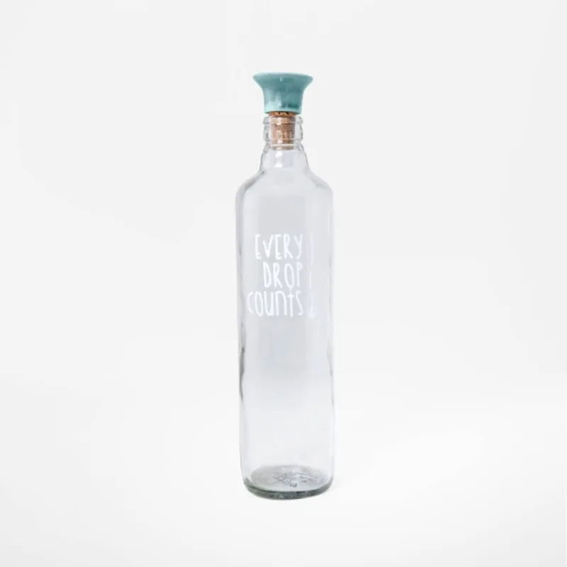 

Drop Glass Water Bottle With Ceramic Stopper 750 ML Eco Friendly Reusable High Quality Clear Glass Sleek Minimalist Design