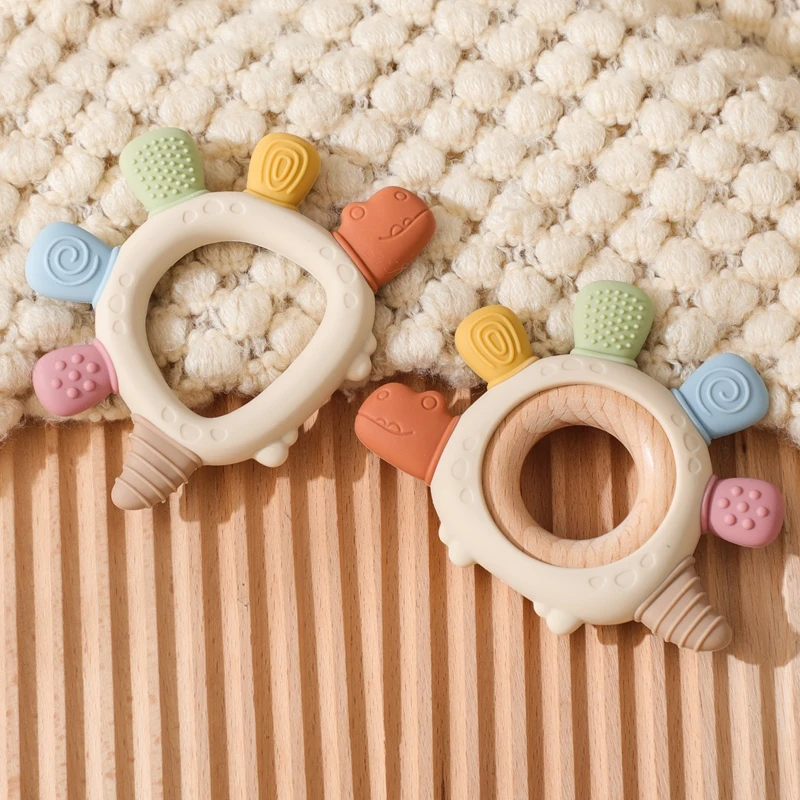 لعبة الديناصور الشوكية ذات الظهر المصنوعة من السيليكون من مونتيسوري هي ديناصور صغير سمين مع أشواك ناعمة ولطيفة على ظهرها مصنوعة من السيليكون