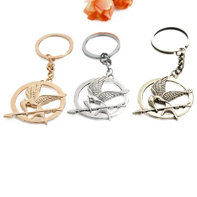 The Hunger Games Keychain Popular Vintage Style Birds Charm Golden Snitch Pendent Key Chain Keyrings Metal Keychains Car Holder