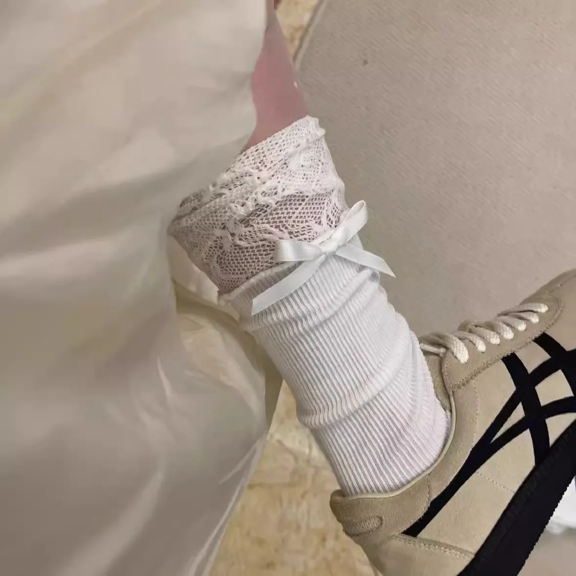 Splicing bow women's socks autumn new black and white lace calf mid leg socks