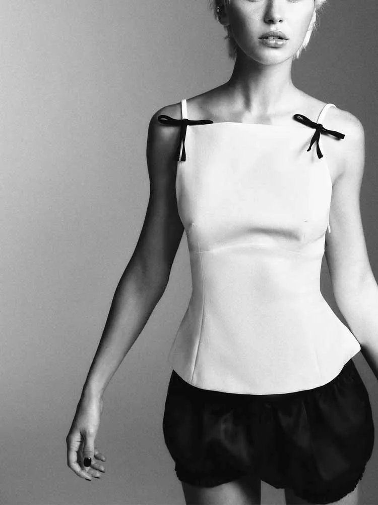 

Зимний новый женский модный повседневный универсальный облегающий топ без рукавов в европейском и американском стиле с бантом