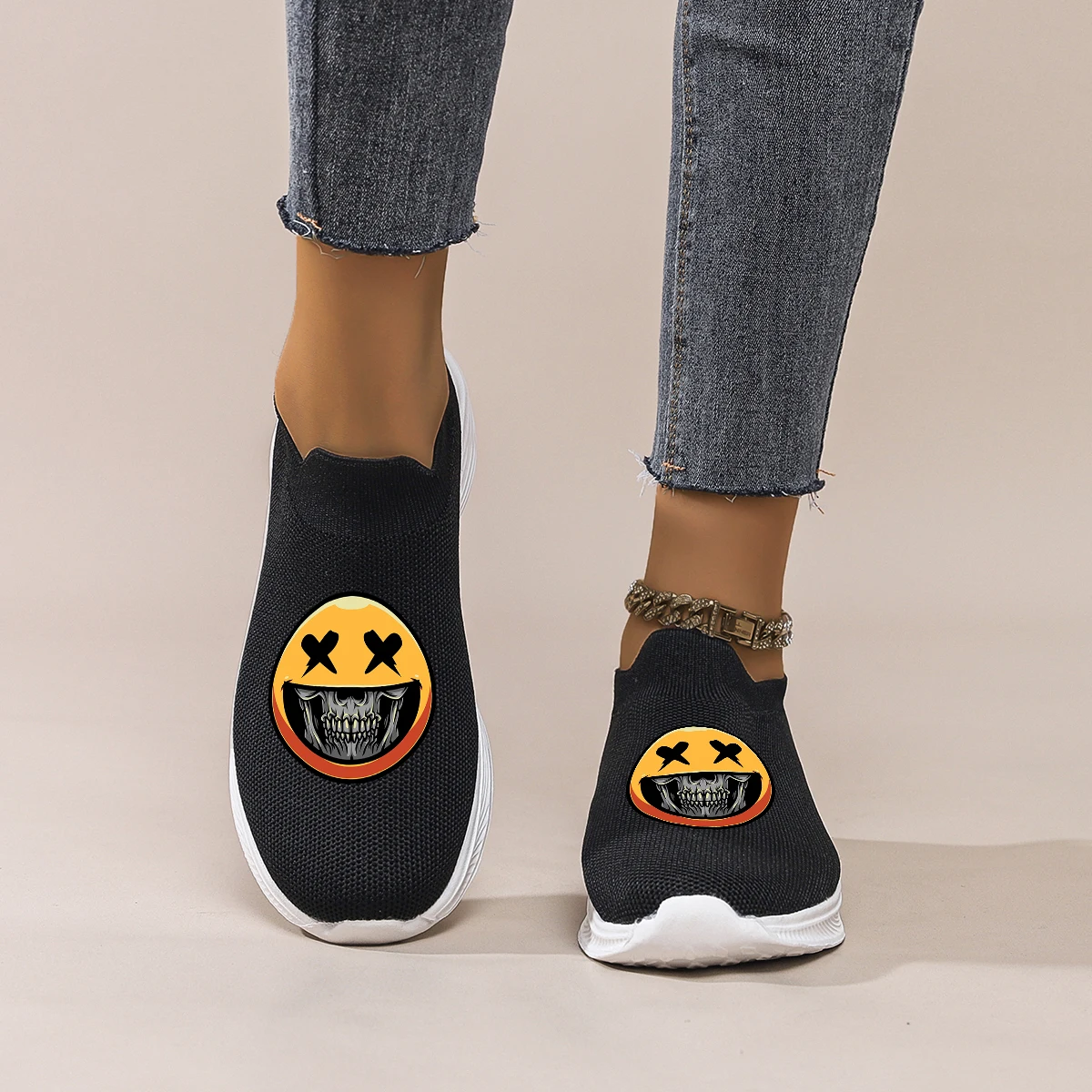 

Women's Black Mesh Slip-On Casual Shoes with Smiley Skull Print: Lightweight & Breathable for Shopping, Dating & Daily Commute.