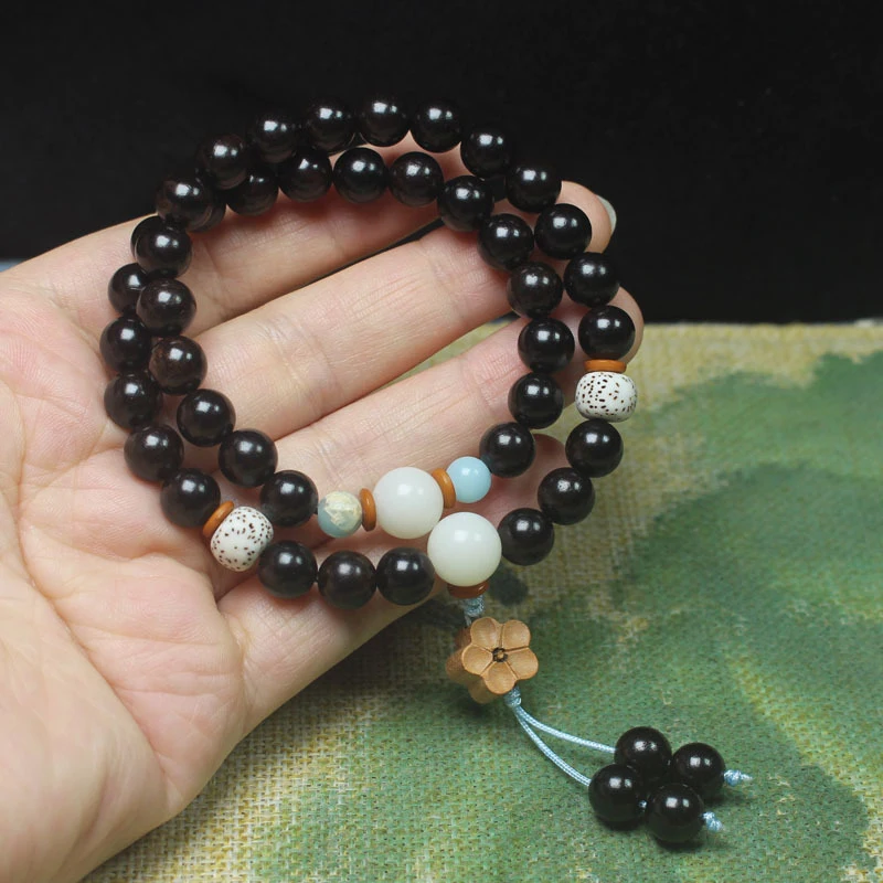 Ebony 8mm double-loop bracelet with star, moon, and small flower beads, simple Buddhist prayer beads, and decorative accessory