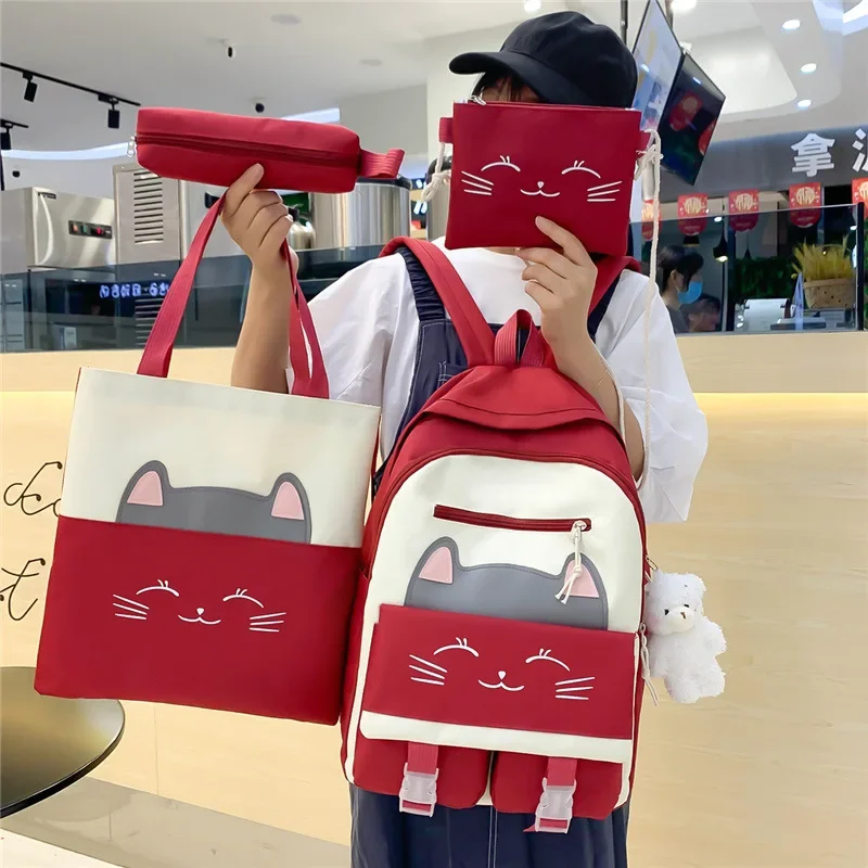 schoolbag women's new cartoon cute cat schoolbag for elementary school students for grades three to six four-piece backpack