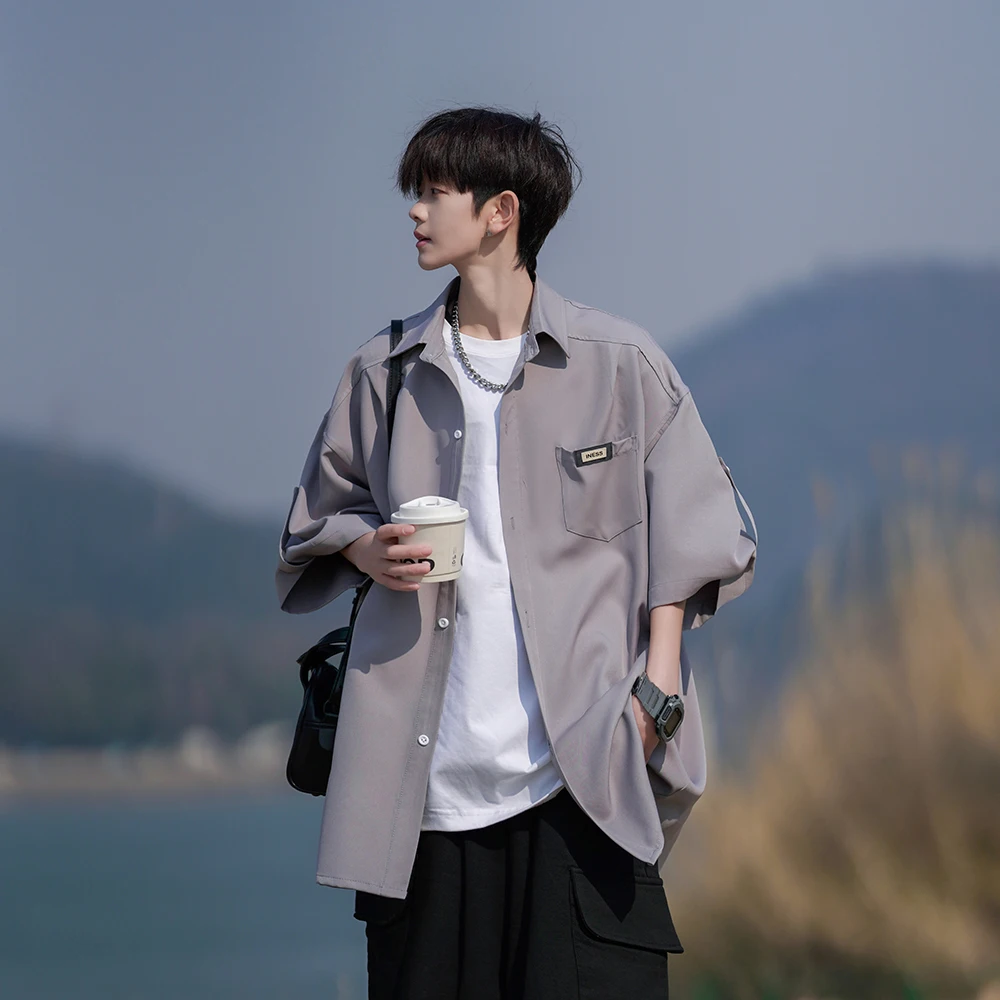 

Летняя повседневная свободная мужская рубашка из ледяного шелка с коротким рукавом, верхняя одежда для пар, модная рабочая одежда из полиэстера на пуговицах