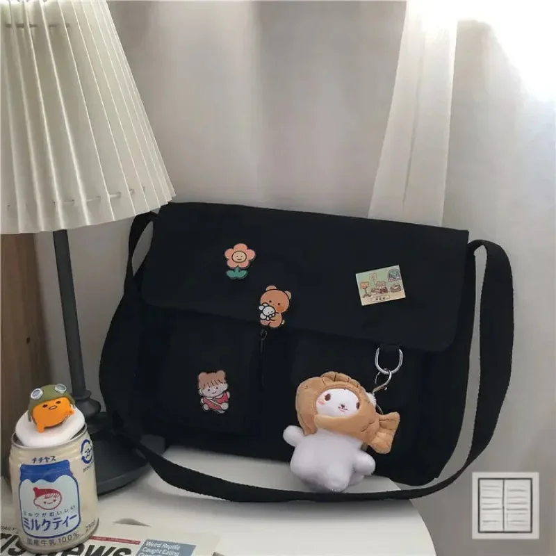 

Korean version Instagram girl crossbody bag, Japanese Harajuku cute retro canvas bag, female student school mailman bag