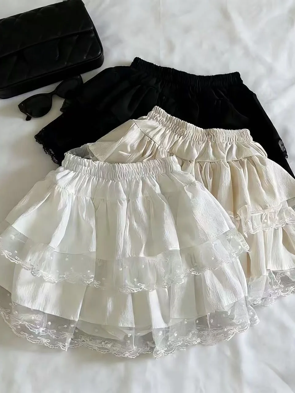 

Свободная женская юбка с высокой талией, весна-лето, с кружевной отделкой, плиссированная, короткая юбка-пачка, с цветочной вышивкой