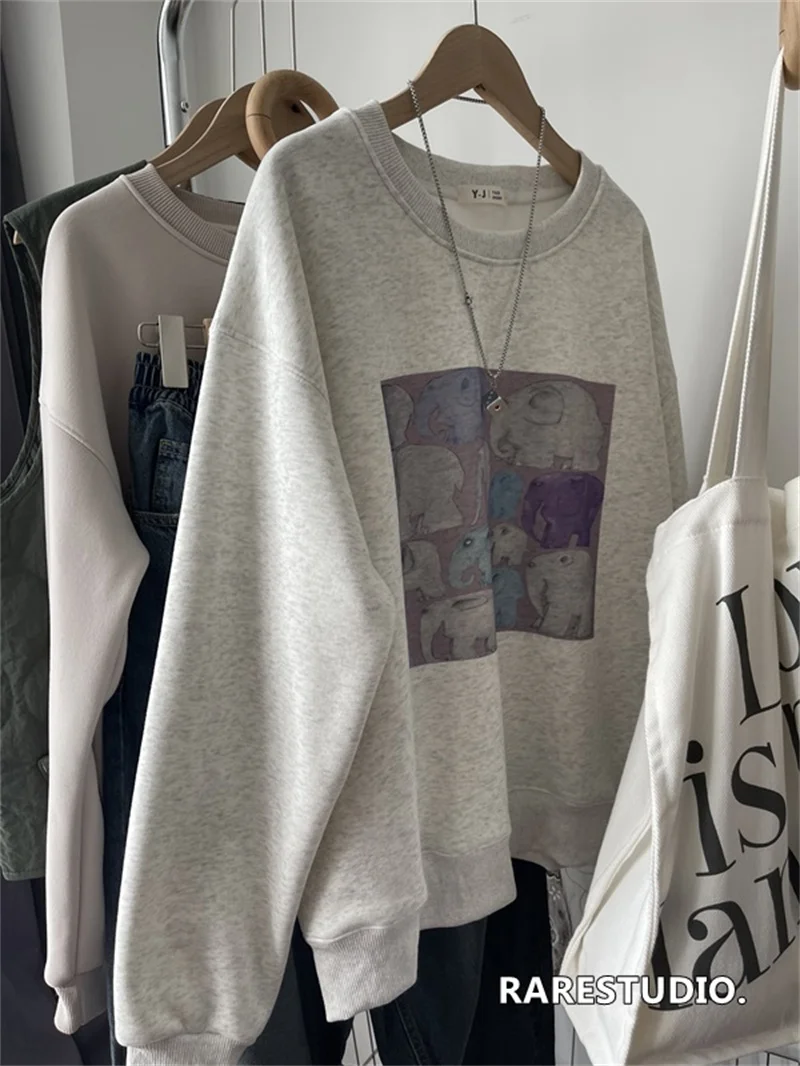 เกาหลี Sle รอบ Ne Fce เรียงรายเสื้อกันหนาวผู้หญิงหลวม Fit Overhead พิมพ์ช้างออกแบบฤดูใบไม้ร่วงฤดูหนาวใหม่มาถึง