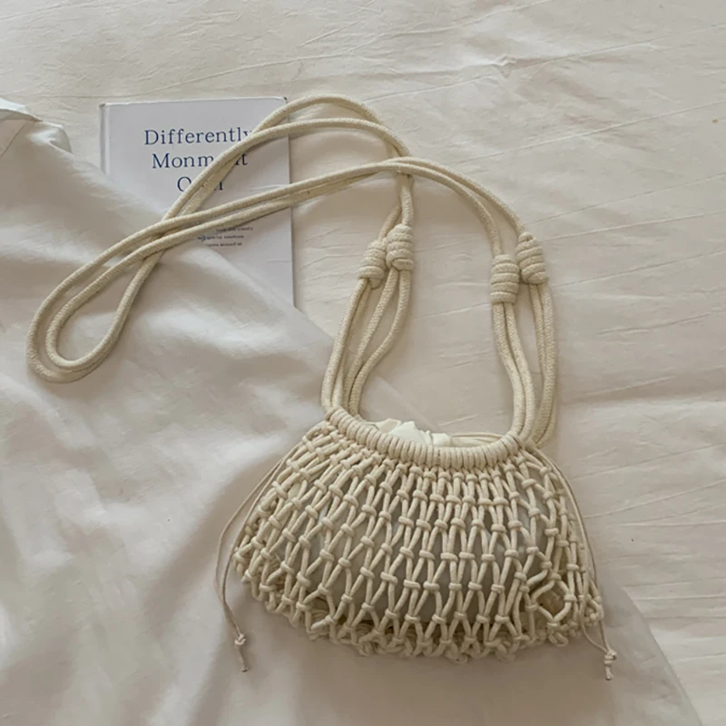 

Women's Small Hollow Drawstring Crossbody Bag Casual Vacation Daily Beach Shoulder Bag 2026 Summer Simple Handbags and Purses