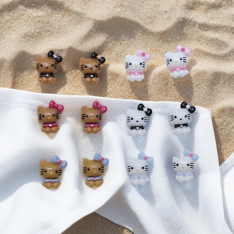 

50Pcs Hello Kitty Bow Nail Charms - Playful Black & White Resin Bows for Chic Kawaii Manicures