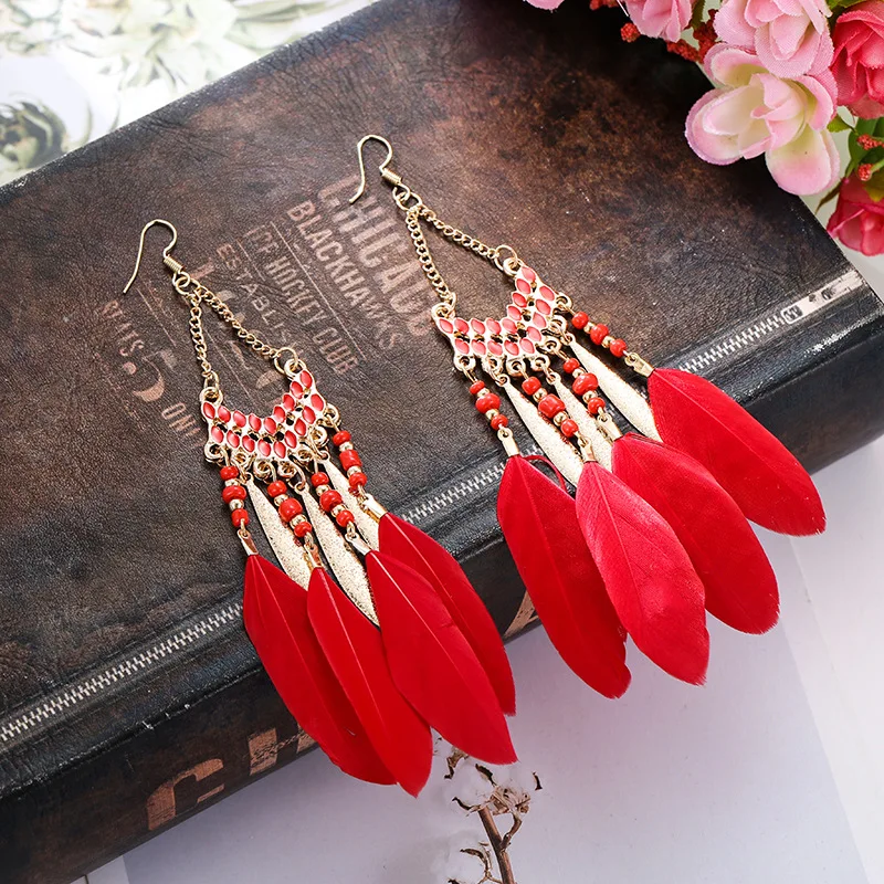 Boucles d'oreilles pendantes bohèmes ethniques pour femmes, pendentifs en plumes, perles colorées, pompons longs, bijoux bohèmes pour filles