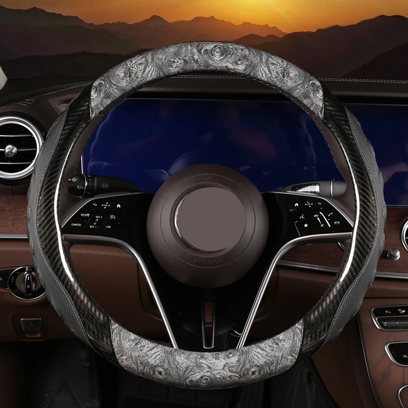 Car peach wood grain PU leather steering wheel cover four seasons general light luxury non-slip comfortable general handle cover