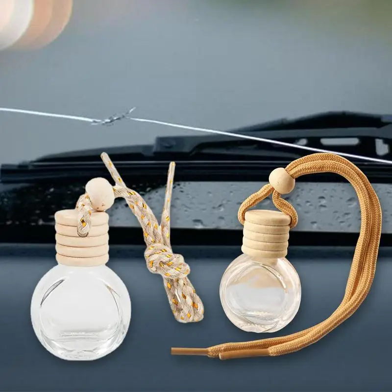 

Car Essential Oil Diffuser Auto Air Freshener Perfume Bottle Perfume Aromatherapy Pendant With Wooden Caps Car Decor Accessories