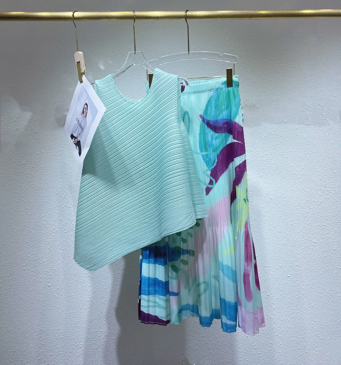 Mezza gonna stampata a pieghe Miyake 2025 Estate Nuova gonna a trapezio con sensazione premium Mezza gonna casual stile piccola fragranza