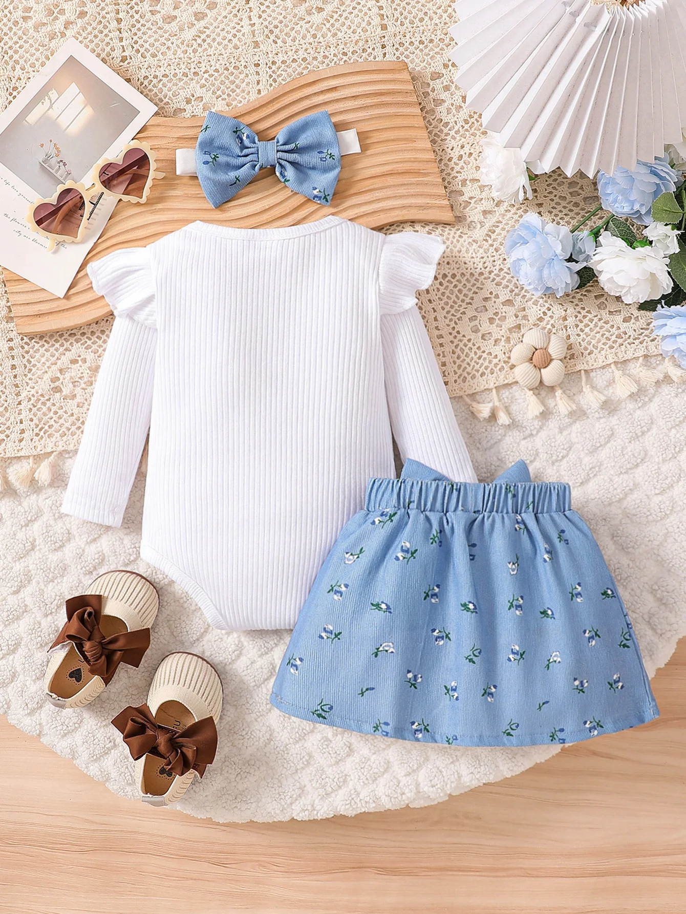 Baby girl's new spring and autumn knitted round neck ruffled long sleeved jumpsuit, blue corduroy short skirt set, and headband