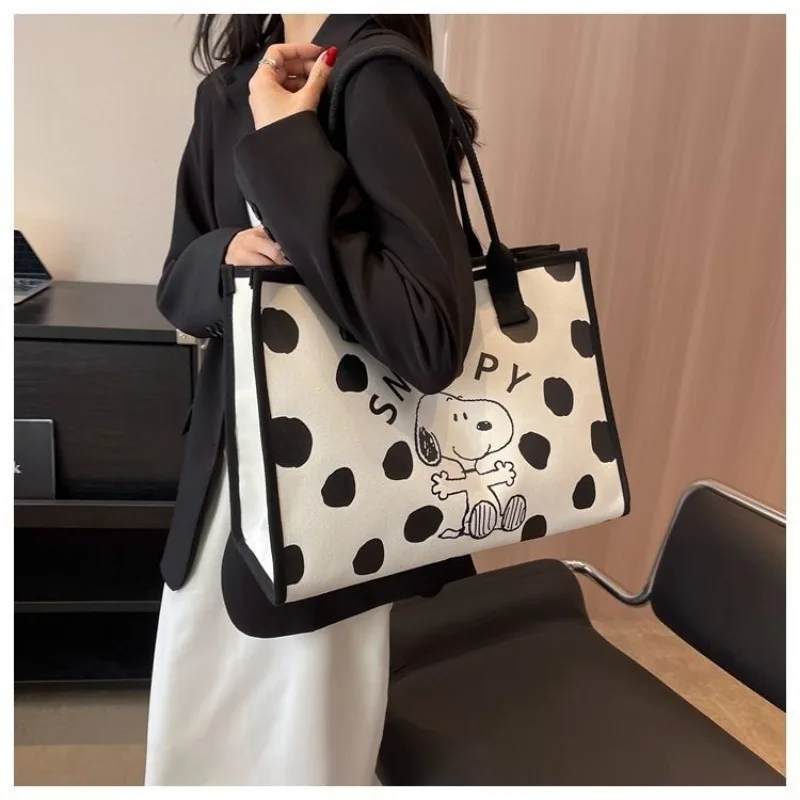 Ms. Snoopy\'s new fashionable and personalized cartoon print simple and versatile large-capacity one-shoulder portable canvas bag