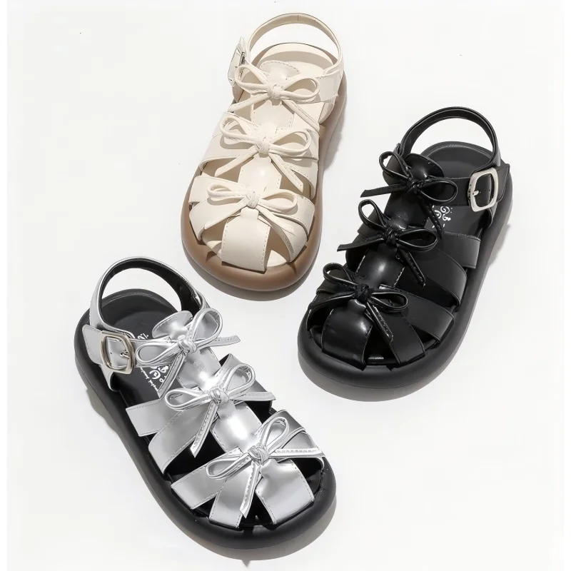 

Детская повседневная обувь, сандалии из искусственной кожи с бантом, модная летняя обувь для девочек, противоскользящая обувь на липучке, серебристо-черные туфли, размер 26-36