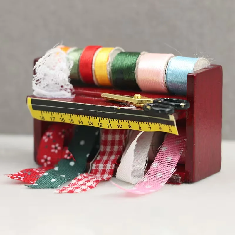 Dollhouse Mini Sewing Box with Lace Details. Ideal for Simulating a Sewing Scenario. With Some Colors Selected at Random.