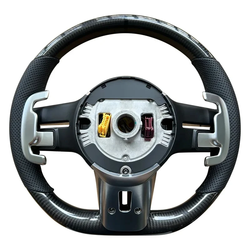 

Carbon fiber dragonfly steering wheel assembly with airbag
