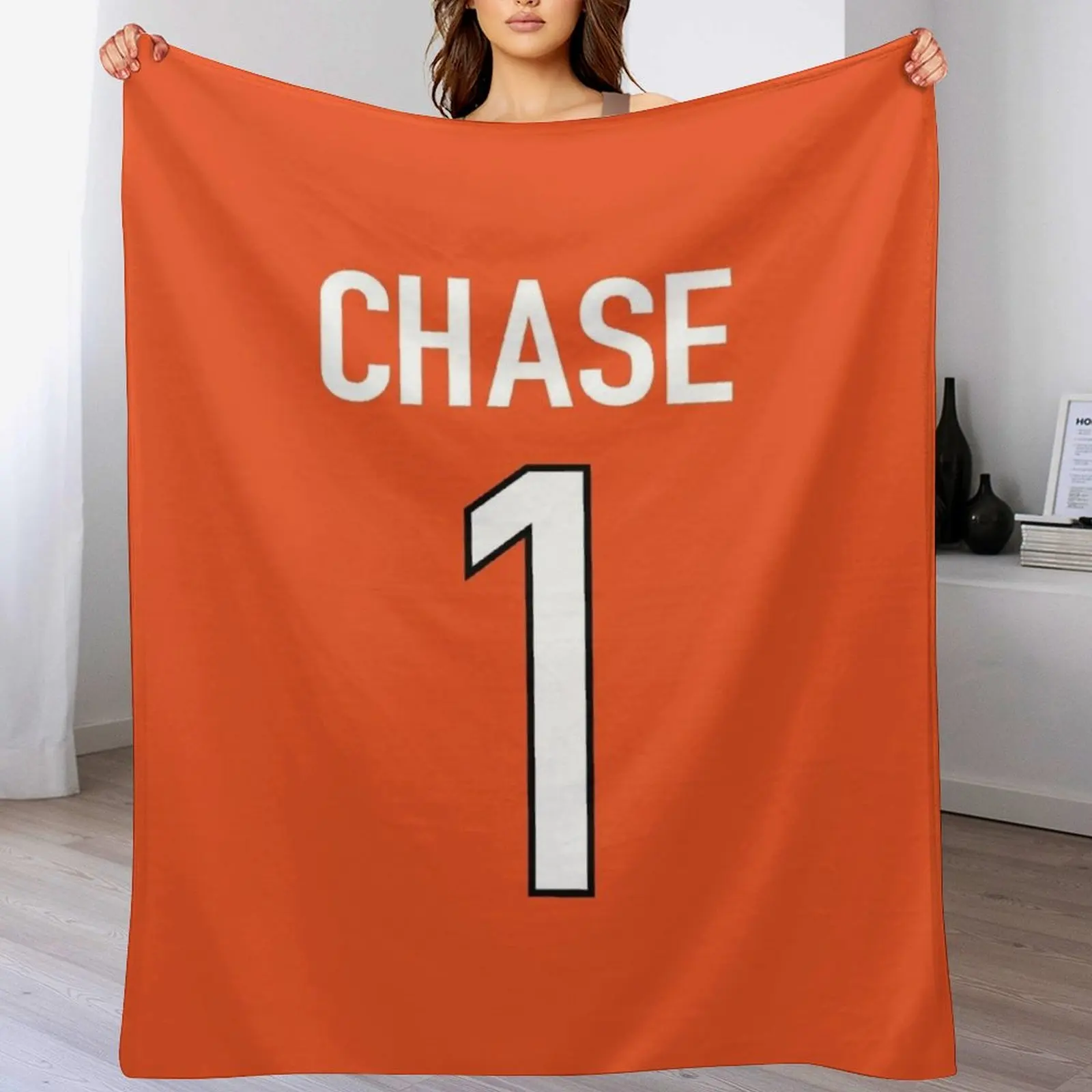 

Ja'Marr Chase Orange Bengals Jersey - #1 Throw Blanket Single Plaid on the sofa Softest Blankets