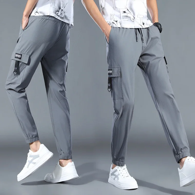 Men Casual Running Sweatpants Gym Jogging Tight Trousers with Multiple Pockets Quick Dry Thin Training Sports Clothes