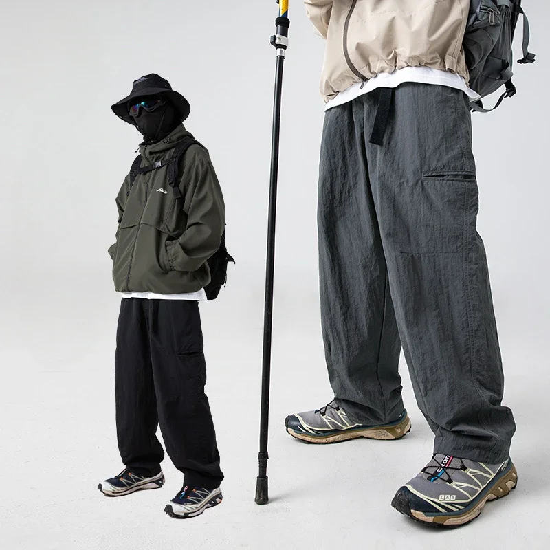 Side pockets for water splashing are designed with loose overalls and trousers sweatpants joggers men