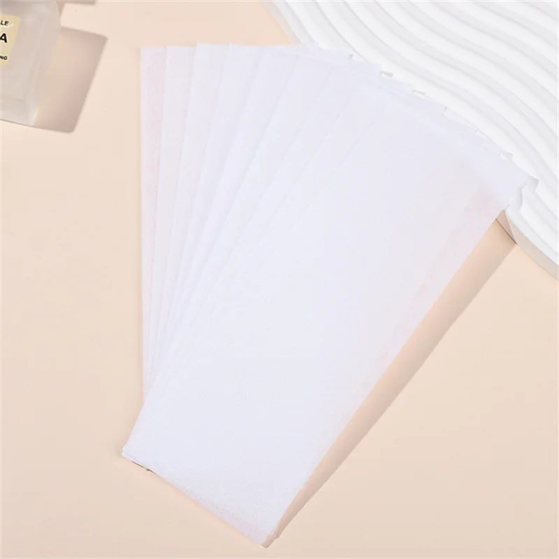 عالية الجودة غير المنسوجة إزالة الشعر لفات ورق شمع 100/500 قطعة الجسم القماش لنزع الشعر شريط شمع لإزالة الشعر