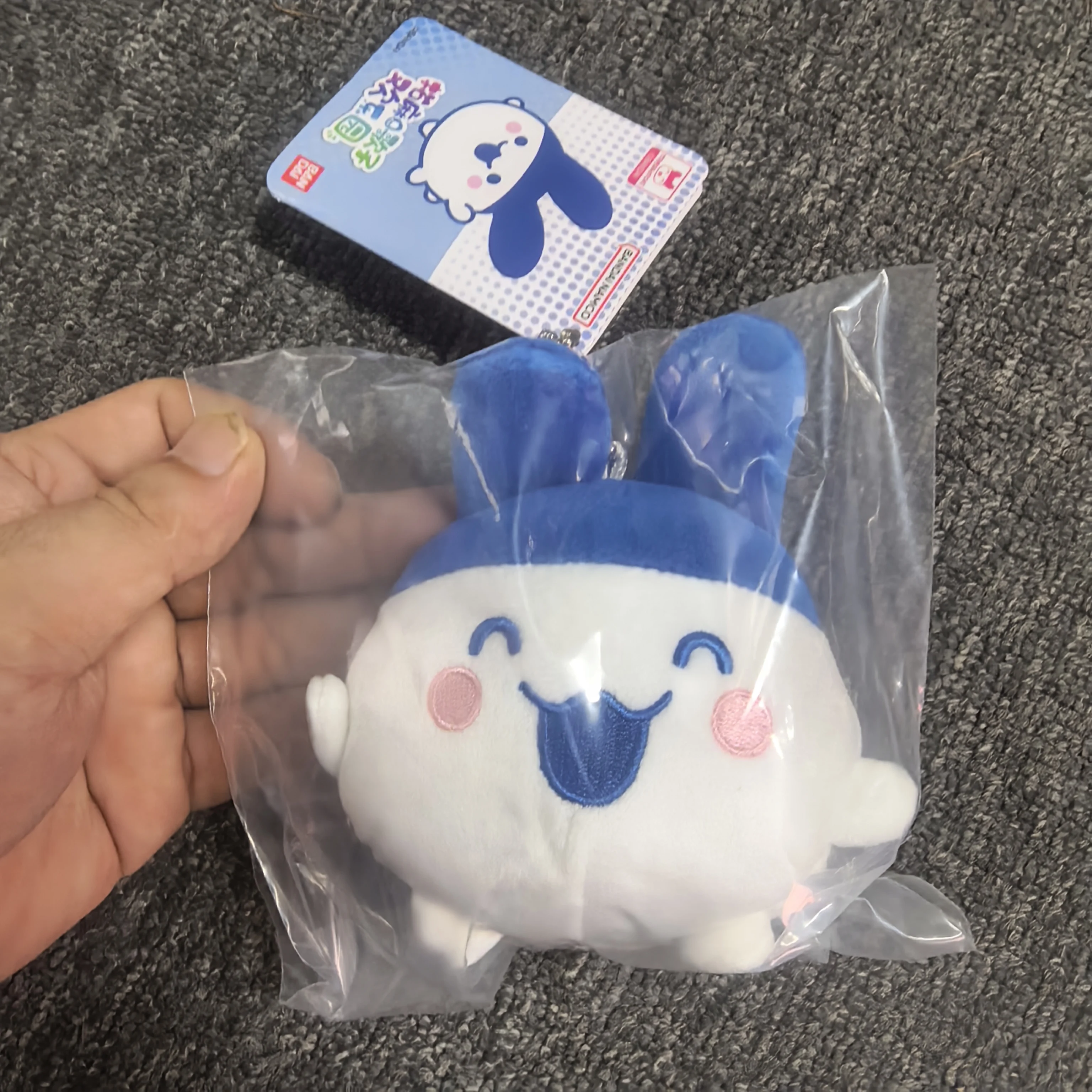 ของแท้จาก Bandai ทามาก็อตจิ โออุจิ โออมิมิ ตุ๊กตาขนนุ่มน่ารัก ของเล่นอิเล็กทรอนิกส์รูปแบบสัตว์เลี้ยง พร้อมกระเป๋าเก็บของแบบเครื่องเล่น  กระเป๋าใส่หูฟัง ของขวัญ