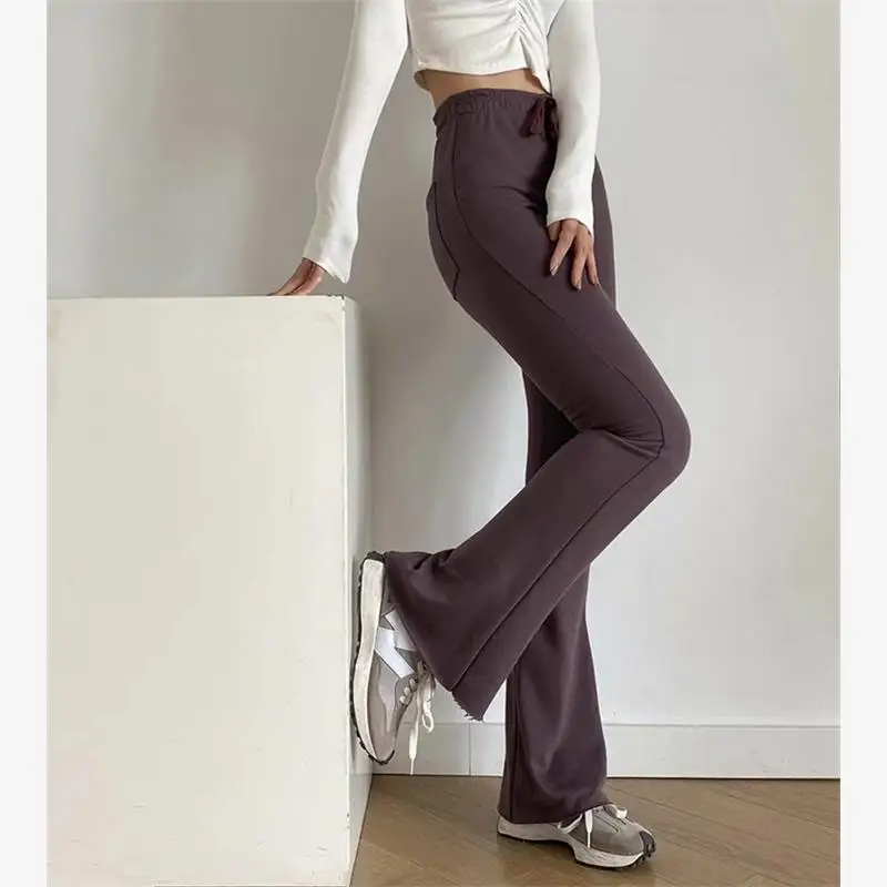 ハイウエスト痩身マイクロフレアパンツ女性のカジュアルスポーツスウェットパンツタイトな尻フィット長ズボンピュアカラー春秋