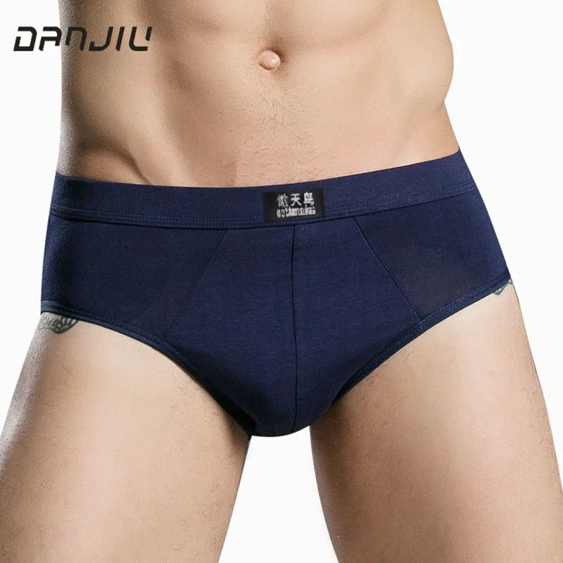 Ropa interior transpirable de Modal sólido para Hombre, calzoncillos sexys de cintura media, suaves y de alta elasticidad