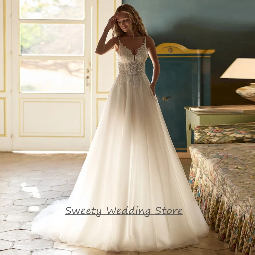 

Sexy Wedding Dress Vestido De Noiva Customized Spaghetti Straps V Neck Sequined Applique Illusion A Line Bridal Gowns