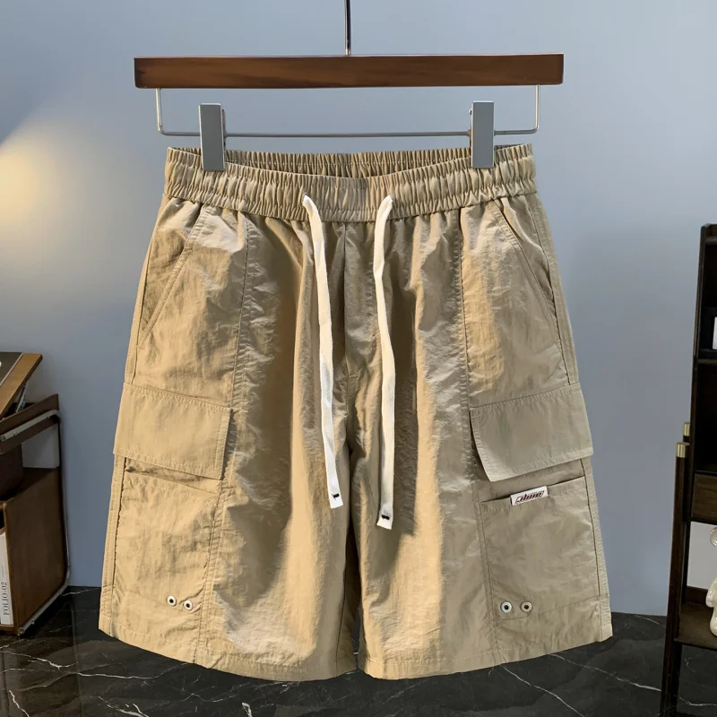 

Летние рабочие шорты мужские, тонкие, модные, универсальные, повседневные, свободные, спортивные, быстросохнущие брюки из ледяного шелка пяти четвертей.