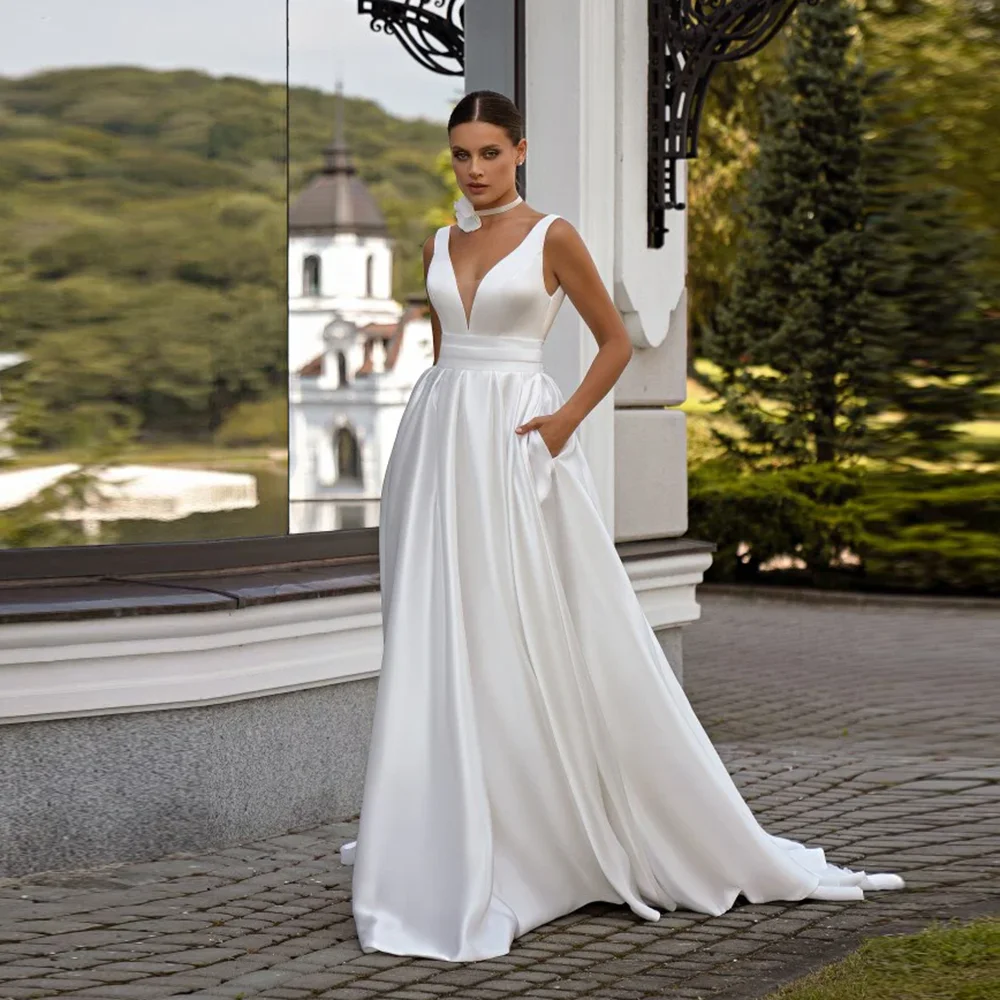 

Popular Spaghetti Straps V-neck Satin Solid Briddal Wedding Dress A-line Wedding Gown with Pockets Court vestidos de novia