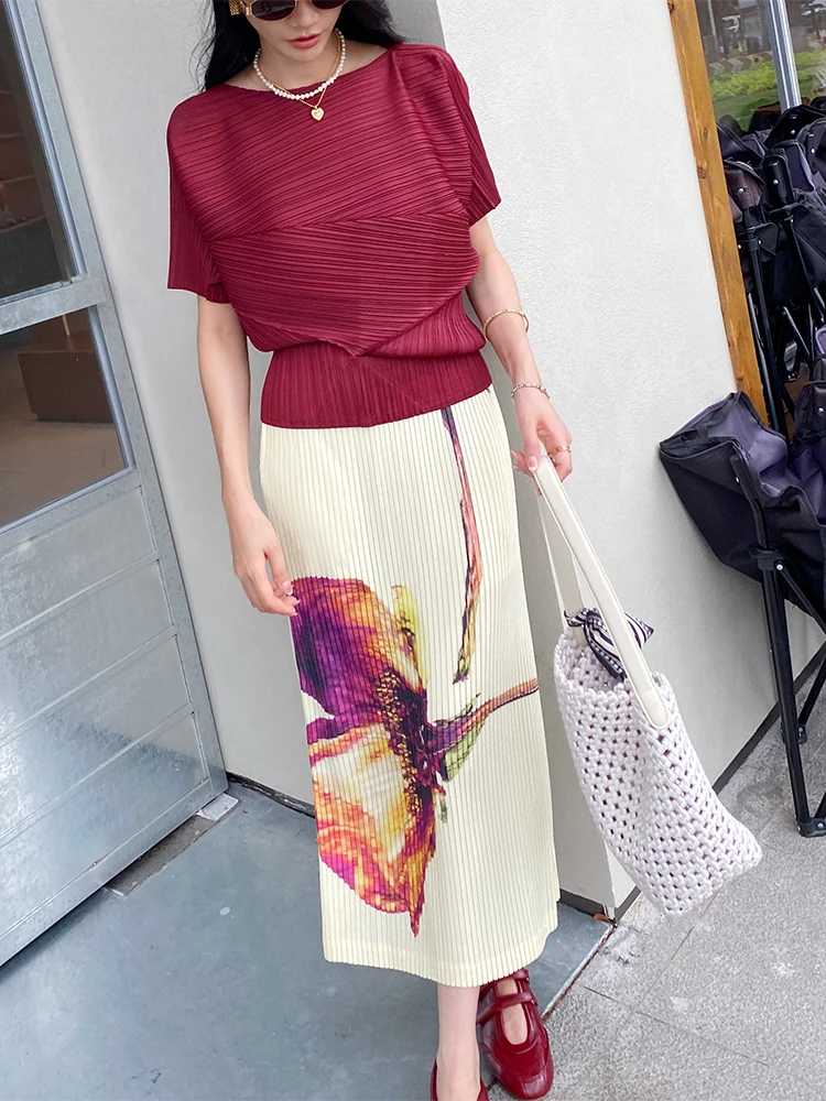 Damska spódnica midi na lato 2025, z wysokim stanem, luźna, elastyczna, w stylu vintage, z modnym nadrukiem, idealna na podróże i do noszenia na co dzień.