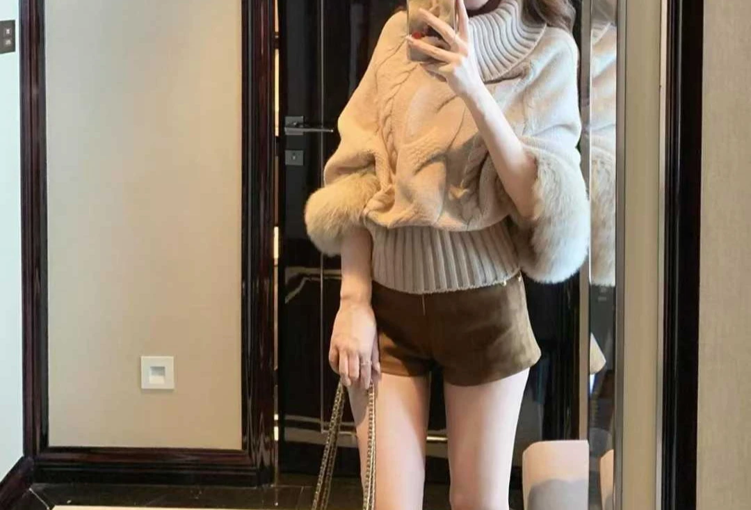 2025 شتاء جديد ملابس نسائية هوديي نصف عالية الرقبة كتف واحد تصميم محبوك سترة