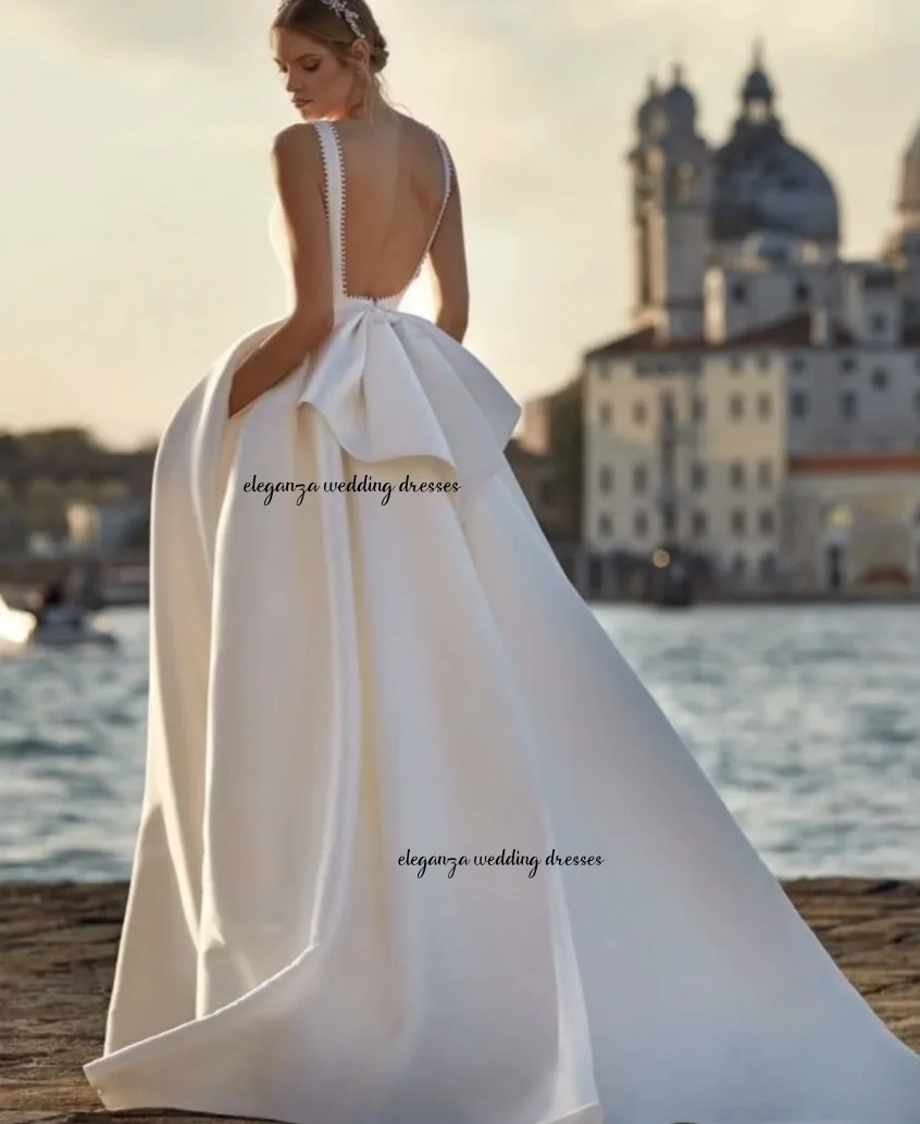 فساتين زفاف كلاسيكية مخصصة من الساتان للمرأة العروس على شكل حرف a على شكل حرف v بدون ظهر بفيونكة لؤلؤ شحن سريع فيستدو دي نوفيا