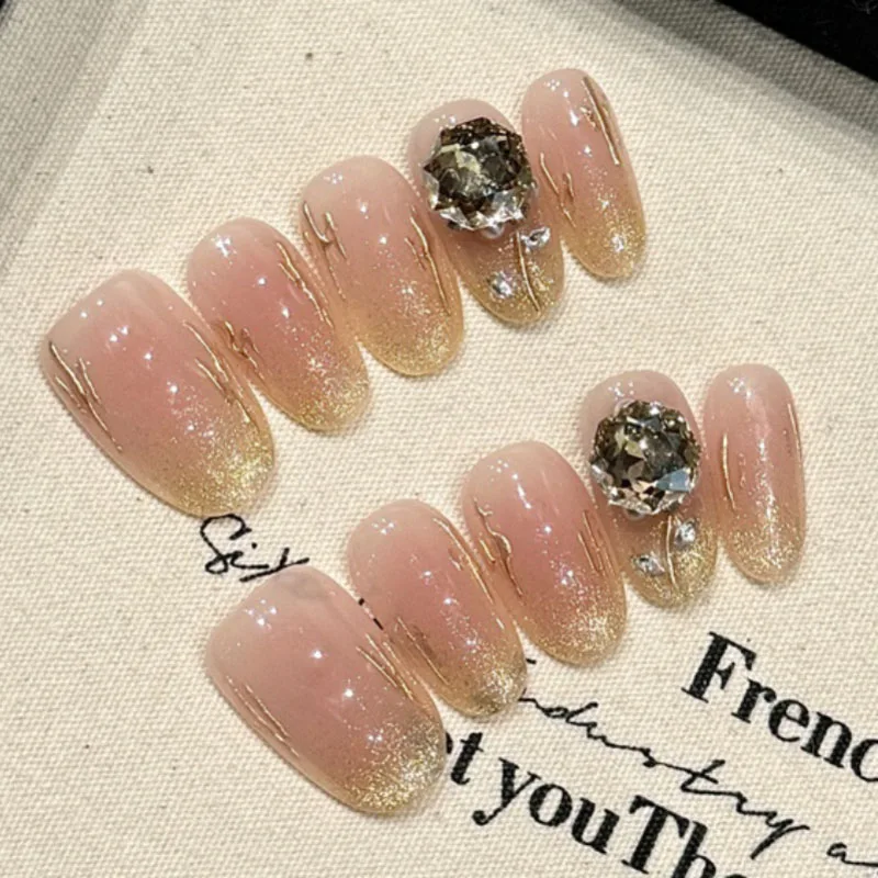 

Champagne Rose | Delicate Pink Medium Almond Press On Nails Cat Eyes Fake Nails 10pcs Handmade Rhinestone Wearable Nail Art Tips