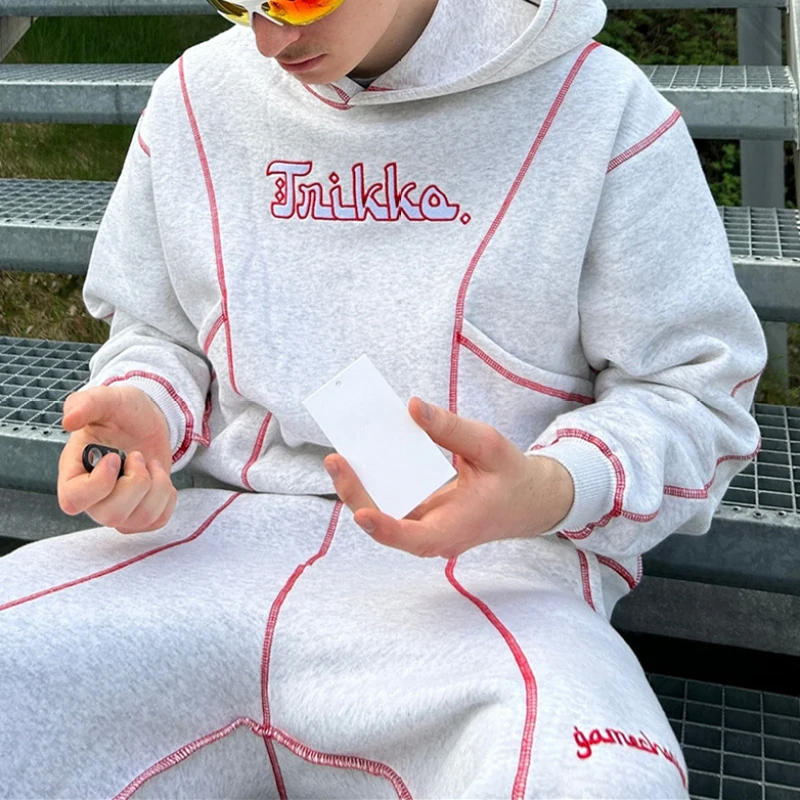Herfst en winter trendy streetstyle geborduurde hiphop heren- en damessweater met capuchon