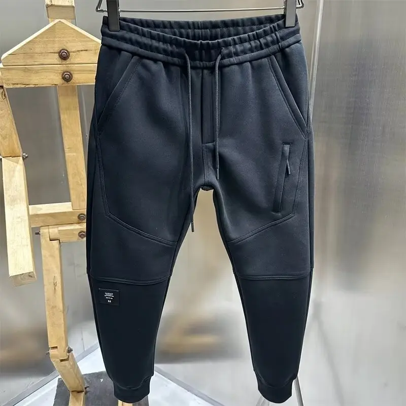 Pantaloni da jogging casual ispessiti in peluche per uomo in autunno e inverno Nuovo abbigliamento sportivo da esterno resistente al freddo e caldo