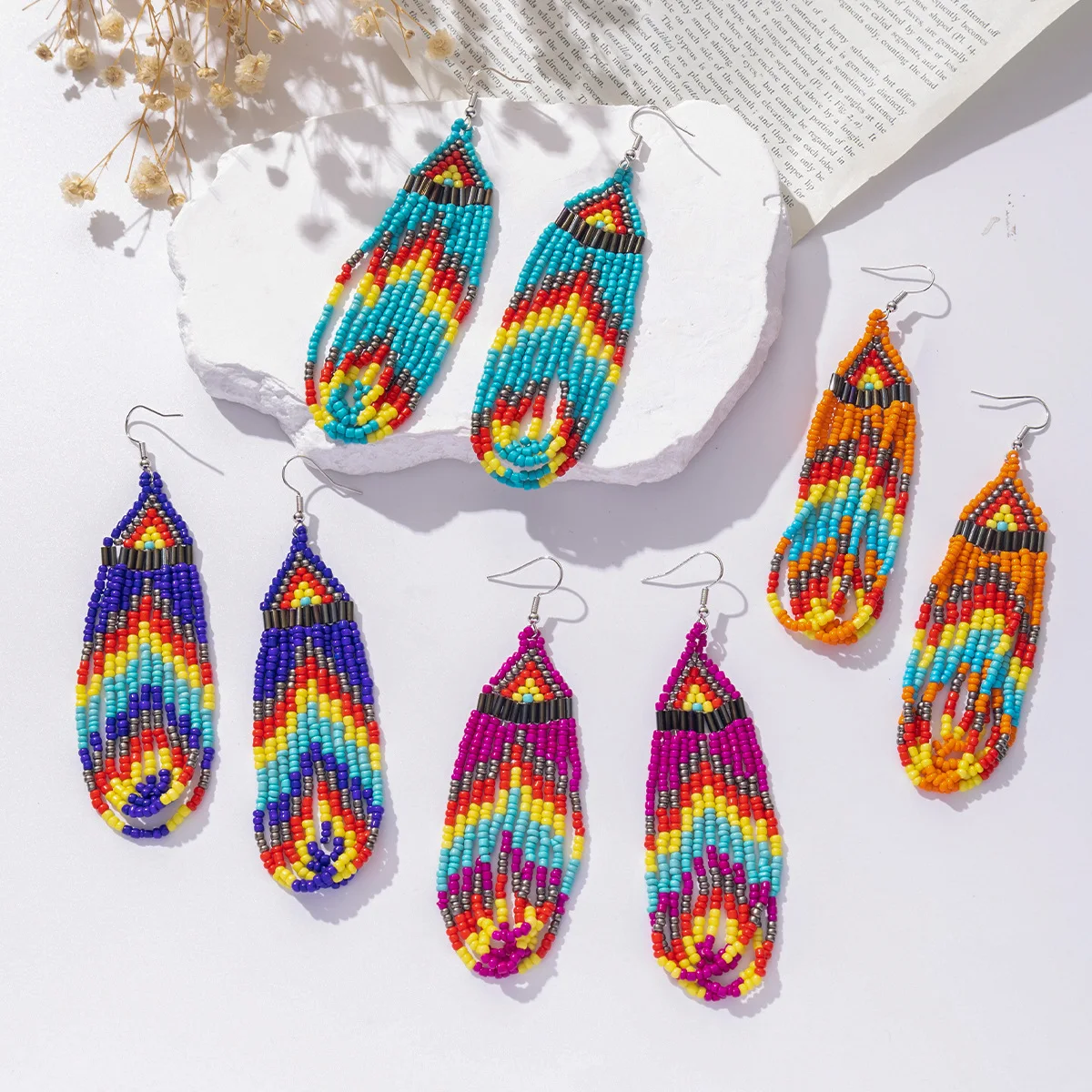 

Rice bead earrings Tassels Rainbow Bohemia Pattern Gradient color Hand weaving Alloy Female Fashion Simplicity Beaded earrings
