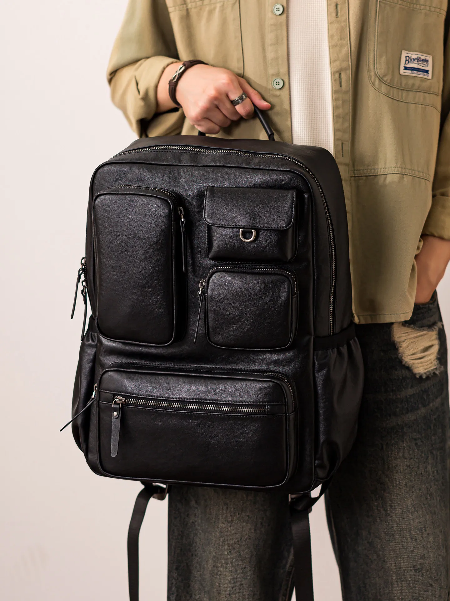 

designer handmade genuine leather men's multi-pocket backpacks outdoor travel luxury cow leather large-capacity black schoolbags