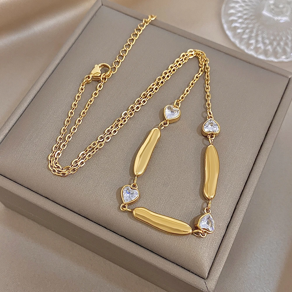 AENSOA Damen Halskette aus Edelstahl in Goldfarbe, lange, zierliche Halskette mit Herz-Zirkon-Verzierung, klassisches Schmuckstück für Partys, Geschenk. – Detail 2