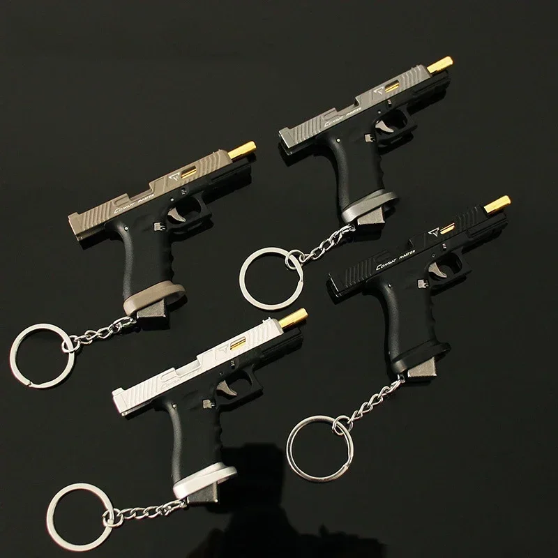 1PC 1:3 Mini Gun Pendant Nylon Hand Grab Half Alloy TTI G34 Pistol Model Metal Keychain