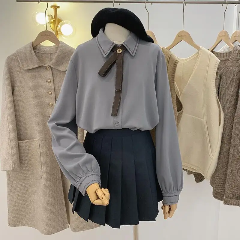 Camicia in velluto a coste stile College per donna primavera autunno 2024 nuova vestibilità ampia a maniche lunghe a strati retrò elegante temperamento Top