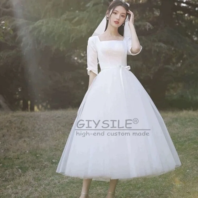 ชุดแต่งงานสีขาวแบบสั่งตัดของ GIYSILE ปี 2026 คอเหลี่ยมสไตล์เฮปเบิร์น สายรัดหลังแบบแฟชั่น กระโปรงฟูฟ่องแบบเจ้าหญิง