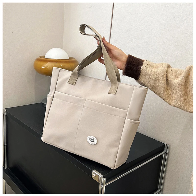 

Canvas Large Capacity Student Shoulder Bag Women's Portable Multi Layered Leisure Handbag Commuting Handbag Underarm Bag