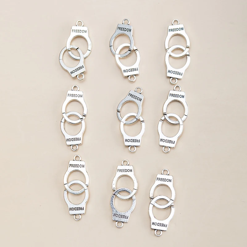 New 10pcs/lot Silver Color Handcuffs Charms Pendant DIY Handmade Bracelet Earrings Necklace for Jewelry Making Accessories