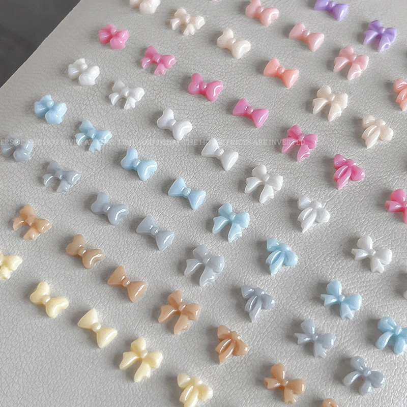 50pcs Candy สีโบว์เล็บอะไหล่ Charms MINI เรซิ่นริบบิ้นเล็บ Rhinestones DIY ฤดูร้อนอุปกรณ์ตกแต่งเล็บ